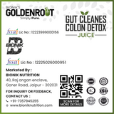 Goldenroot Herbal Juice bottle with golden liquid, featuring labels for Ayurvedic digestive wellness with Triphala and lemongrass.