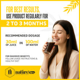 Bottle of Nature's Hive Gut Cleanse Herbal Juice, 1 L, showing the herbal-infused liquid in a clear glass bottle.