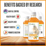 Nature's Hive Seabuckthorn Herbal Juice in a 1-liter bottle, featuring omega 3, 6, 7, and 9, with fresh seabuckthorn berries.