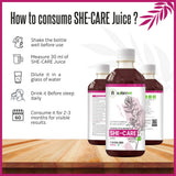 Bottle of Nature's Hive She Care Herbal Juice, 1 liter, showing the label and herbal ingredients in the transparent bottle.