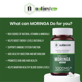 Nature's Hive Moringa Tablets herbal supplement bottle with 60 tablets, natural plant-based health support.